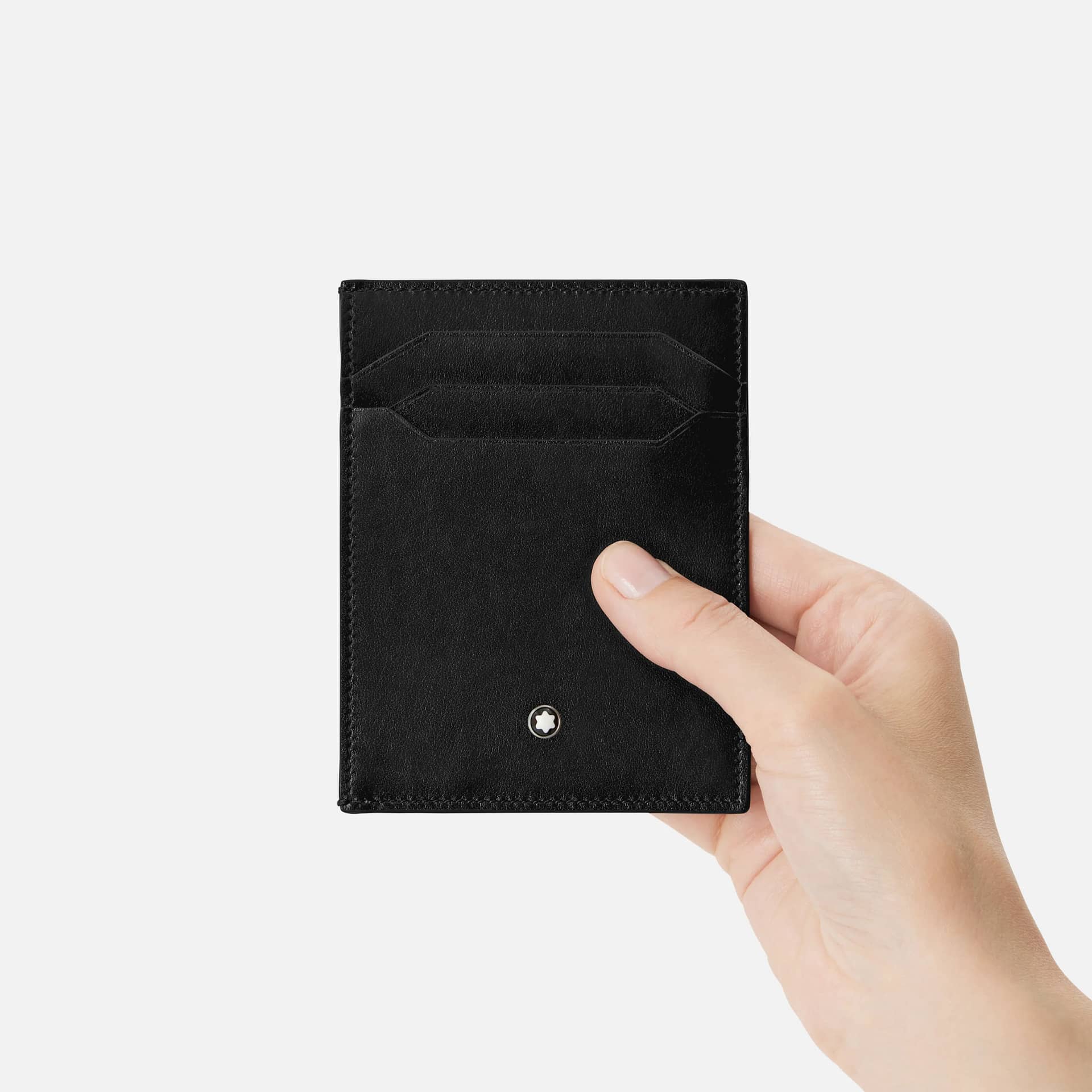 Porta carte Montblanc Meisterstück 4 scomparti tenuto in mano con emblema metallico